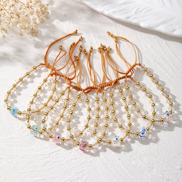 Faceted Clear Bead and Gold Tone Evil Eye Cord Bracelets