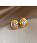 Gold Tone Brushed Oval Stud Earrings With Clear Crystal Centers view 6