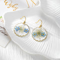 Gold Tone Blue Pressed Flower Drop Earrings in Three Geometric Shapes view 2