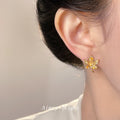 Gold Maple Leaf Stud Earrings With Amber And Clear CZ view 2