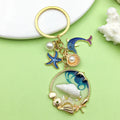 Starfish, Conch and Shell Charm Keychains Featuring Pink Shell Across 59 Variations view 3