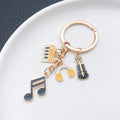 Yellow-Led Guitar Piano Violin and Headphone Charm Keychain Collection view 4