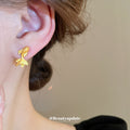 Gold Tone Goldfish Stud Earrings with Textured Tails view 3