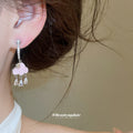 Pink Cloud Crystal Tassel Clip On Earrings With Polished Metal Details view 3