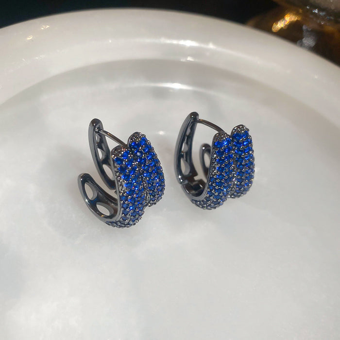 Gunmetal Blue Crystal Huggie Earrings in Wing and Block Shapes