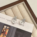 Silver Leaf and White Pearl Look Small Stud Earrings view 3