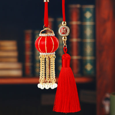 A front product view shows the mixed festive car hanger with its visible ornament and hanging hardware.