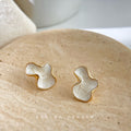 Gold Tone White Pearlescent Abstract Organic Shape Stud Earrings view 3