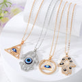 Gold and Silver Tone Crystal Evil Eye Pendant Necklaces in Four Styles view 1
