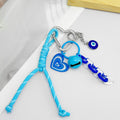 Blue Braided Cord Keychain With Heart Charm And Bell view 3