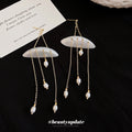 White Shell Disc Drop Earrings with Pearl and Chain Tassel Details view 2