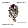 Ornate Teardrop Crystal Brooch with Filigree Scrolls view 10
