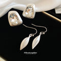 Silver Abstract Teardrop Earrings In Hook And Stud Styles view 1
