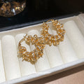 Pair of Metal Tone Gold Tone Crystal Wreath Hoop Earrings view 2