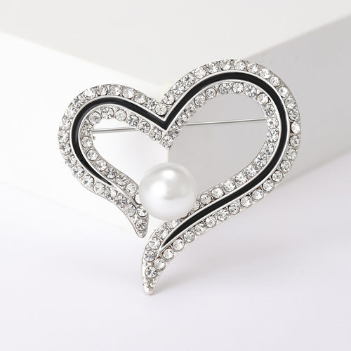 Angled display of Openwork Double Heart Crystal brooch