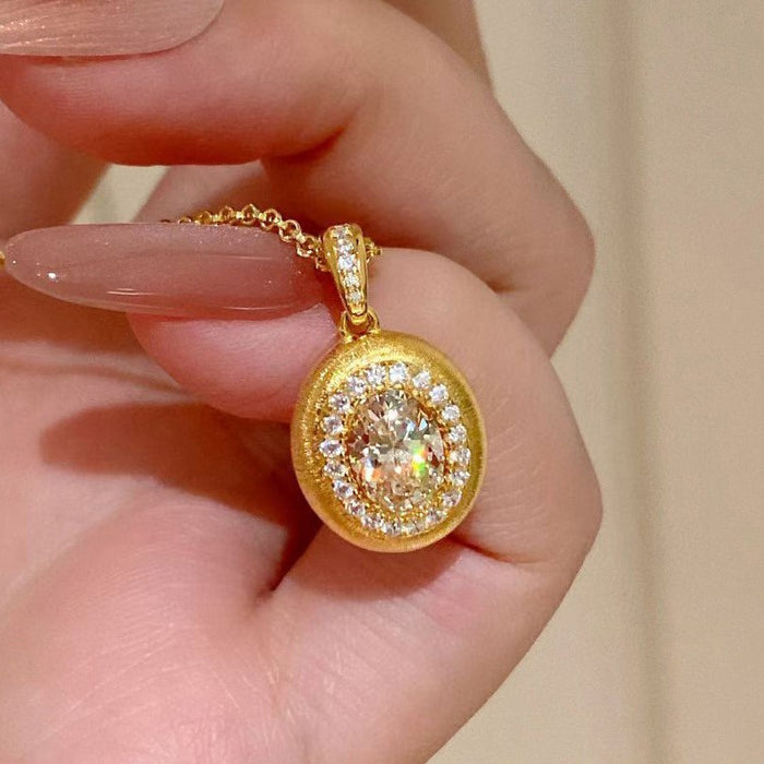 Gold Tone Matte Oval Champagne Halo Pendant Necklace