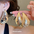 Gold and Silver Polished Teardrop Stud Earrings Statement Jewelry view 1