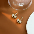 Gold Bow Crystal Drop Earrings with Pearl Bead Hoops view 3