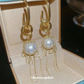 Gold Pearl and Chain Tassel Earrings with Circular Links view 4