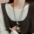 Black Cord Silver Croissant Bun Adjustable Pendant Necklace view 1