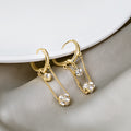 Gold Heart Huggie Hoop Earrings Crystal Ball Dual Chain view 1