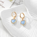 Gold Tone Crystal Heart Huggie Earrings in Seven Color Options view 9