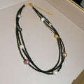 Layered Bead and Pearl Necklaces in Three Cord Colors view 8