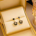 Black Heart and Camellia Flower Clear Look Drop Earrings view 1