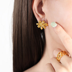 Asymmetric Ribbed Flower Stud Earrings Gold And Steel