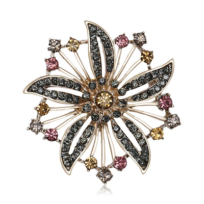 Product display showing a radial openwork flower with dark and pink rectangular crystals