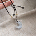Dark Braided Cord Necklace With White Pearlescent Crescent Pendant view 3