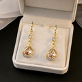 Yellow Green and Pink Teardrop Gold Tone Huggie Earrings view 8