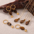 Gold Titanium Steel Tigers Eye Oval Pendant Necklace Earring Set view 3