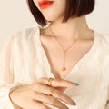 Y Lariat Paperclip Chain Necklace with Hammered Ball Pendant view 3