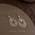 Silver Tone Openwork Teardrop Flower And White Pearl Hook Earrings view 3