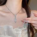 Open Oval Crystal Necklace and Drop Earrings in Silver Tone view 2