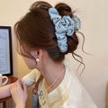 Blue Satin Heart Hair Claw With Black Polka Dots And Ruffles view 3