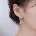 Clear Rectangle Bow and Teardrop Silver Dangle Earrings view 1