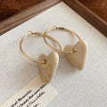 Gold Tone Hoop Earrings with Resin Heart Drops in Three Colors view 7