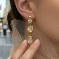Gold Triple Irregular Zircon Drop Earrings Bezel Set Stones view 1