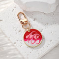 Gold Tone Round Marbled Swirl Enamel Clip Keychains in Six Colors view 7