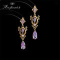 Gold Purple Crystal Long Dangle Earrings Ornate Scroll view 3