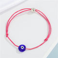 Round Blue Evil Eye Cord Bracelets in Six Bright Colors view 8