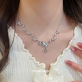 Silver Tone Butterfly Necklace with Blue Crystal Accents view 3