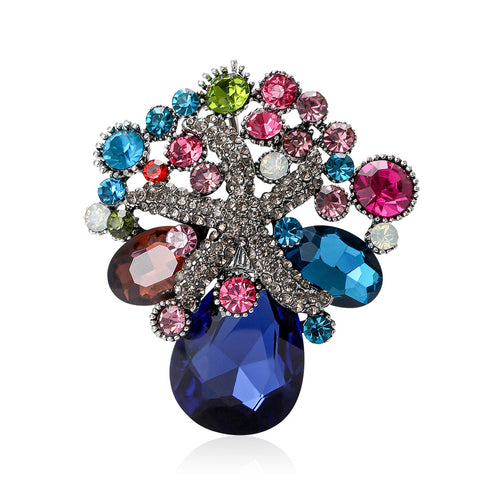 Silver multicolor rhinestone tree brooch front on white