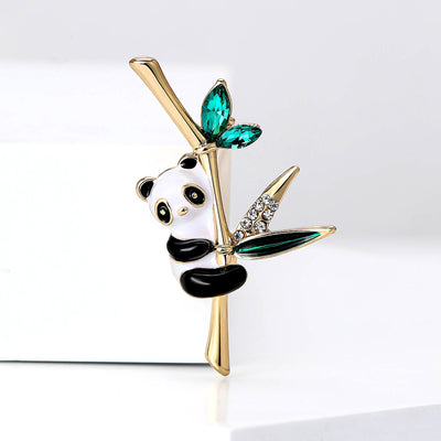 Playful Panda on Bamboo Brooch with Green Crystal Leaves grouped product view