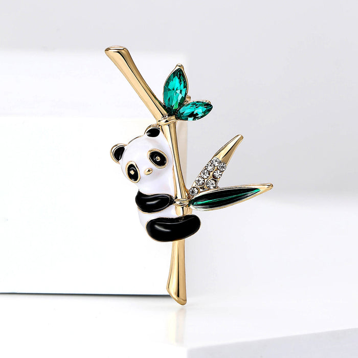 Playful Panda on Bamboo Brooch with Green Crystal Leaves