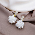 White Petal Cluster Crystal Look Gold Huggie Earrings view 1