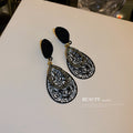 Black Filigree Floral and Checkered Statement Earrings view 3