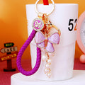 Pearl Strand Crystal Bow Keychains with Cords and Loose Heart Loops view 1